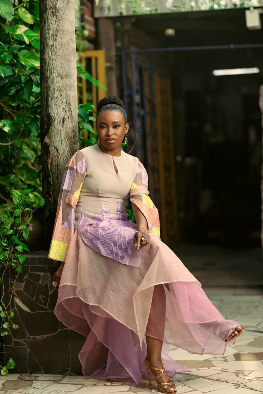 Ejiro Amos Tafiri, founder of the E.A.T fashion house, in a lilac organza gown